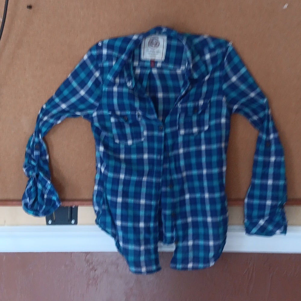 Cute multi color blue Plaid shirt by SO, Says size M..It should say XS!